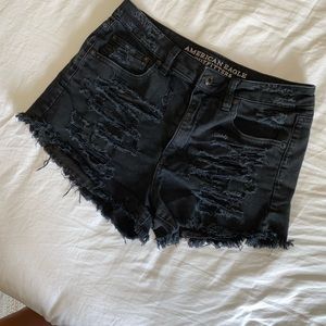 AE Black distressed denim shorts